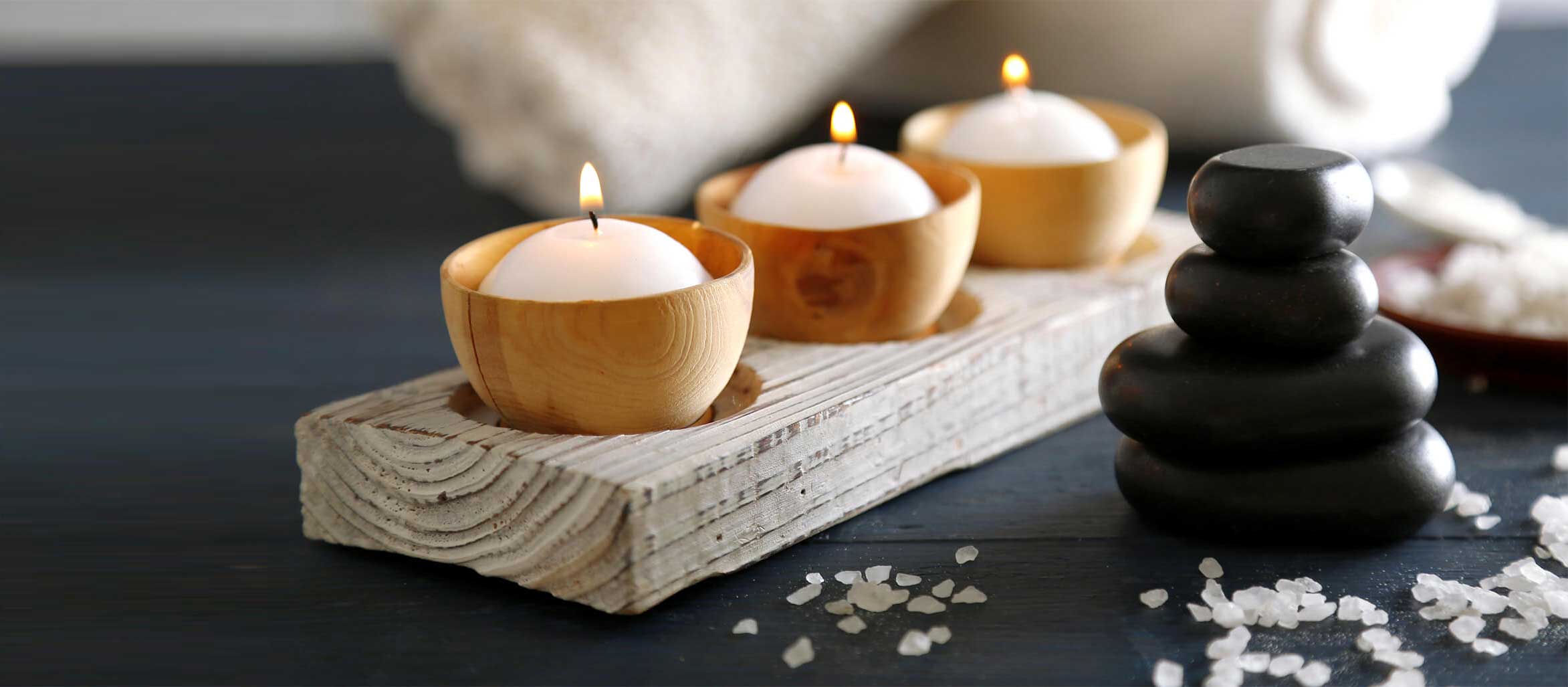 stacked rocks and candles at Robvia day spa
